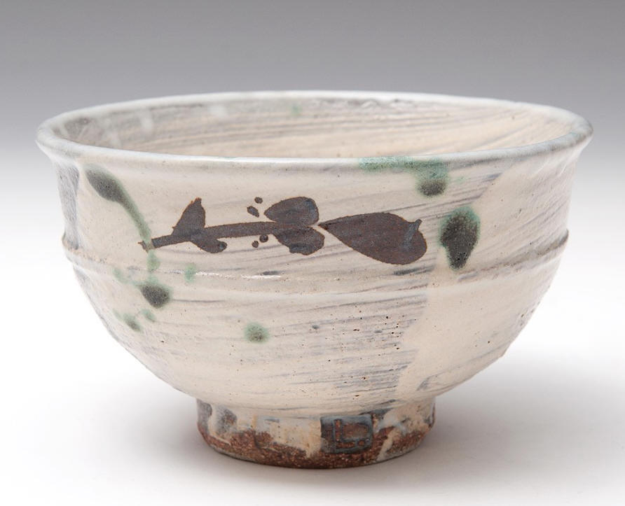 Tea Bowl, brushed slip, iron decoration & copper splashes by Jim Malone