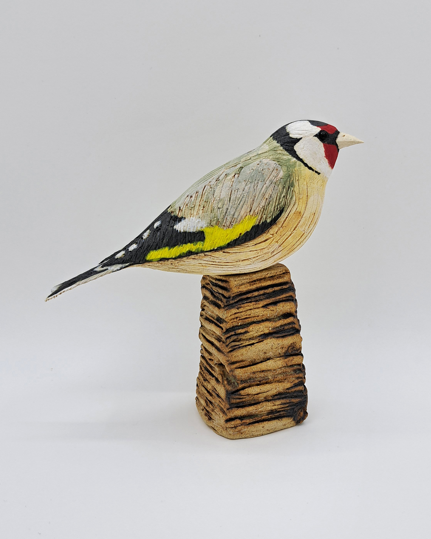 Goldfinch on Block by Annie Tortora