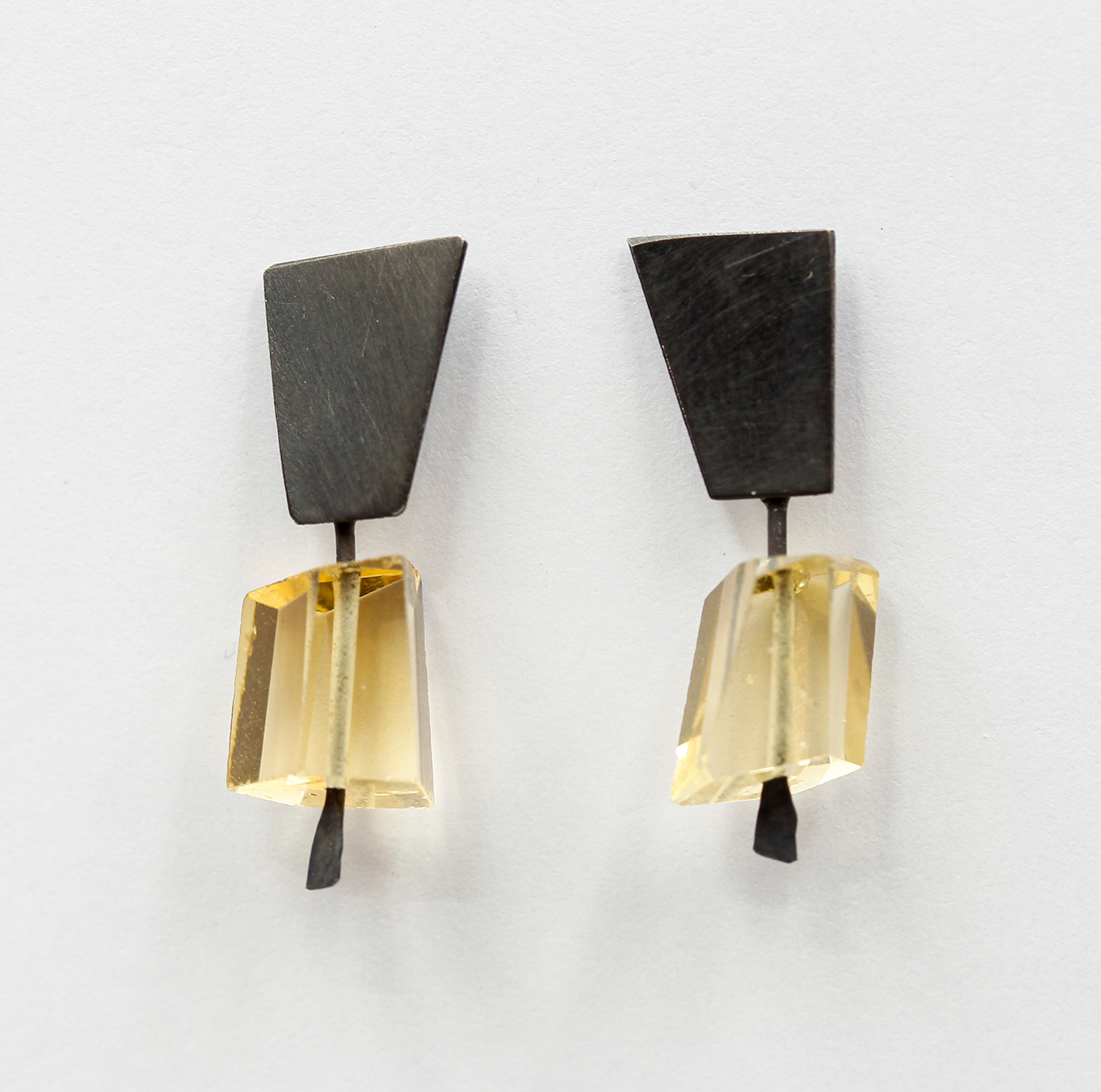 Earrings by Daphne Krinos