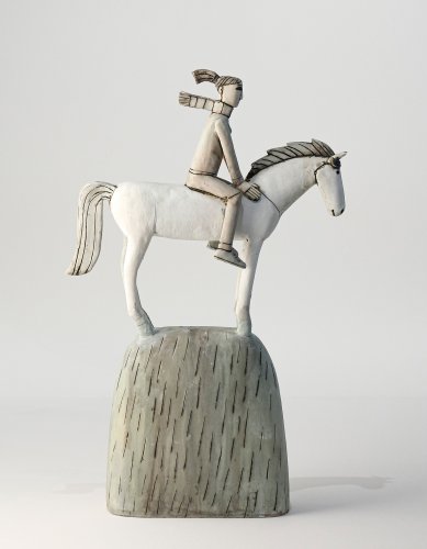 Lady Rider on a Hill in the Wind
