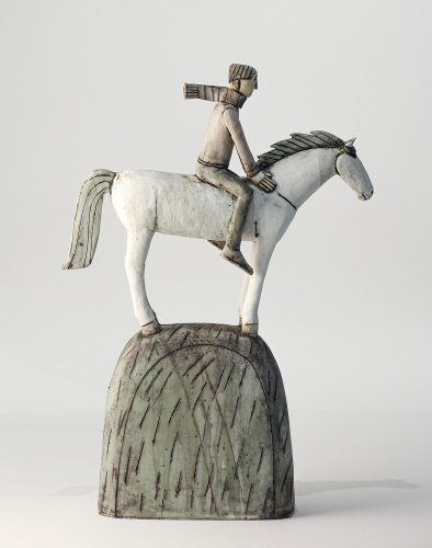 Rider on a Hill in the Wind