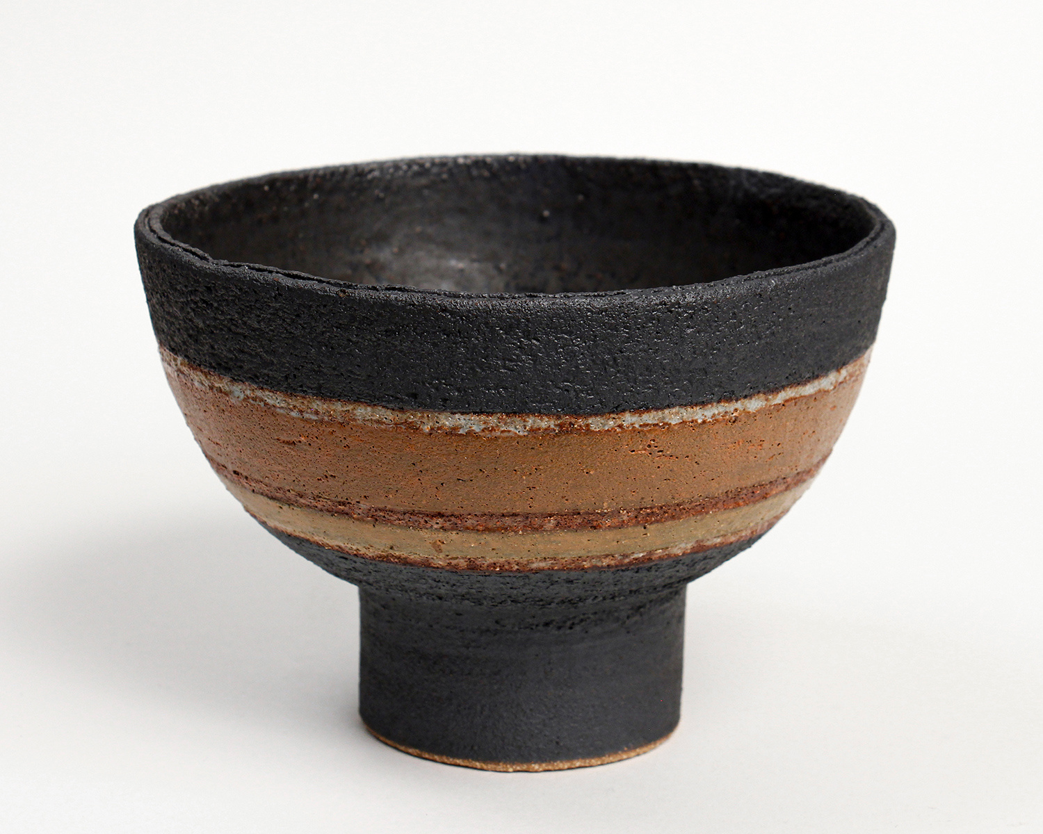 Black/Tan/Orange Bowl by Rosalie Dodds