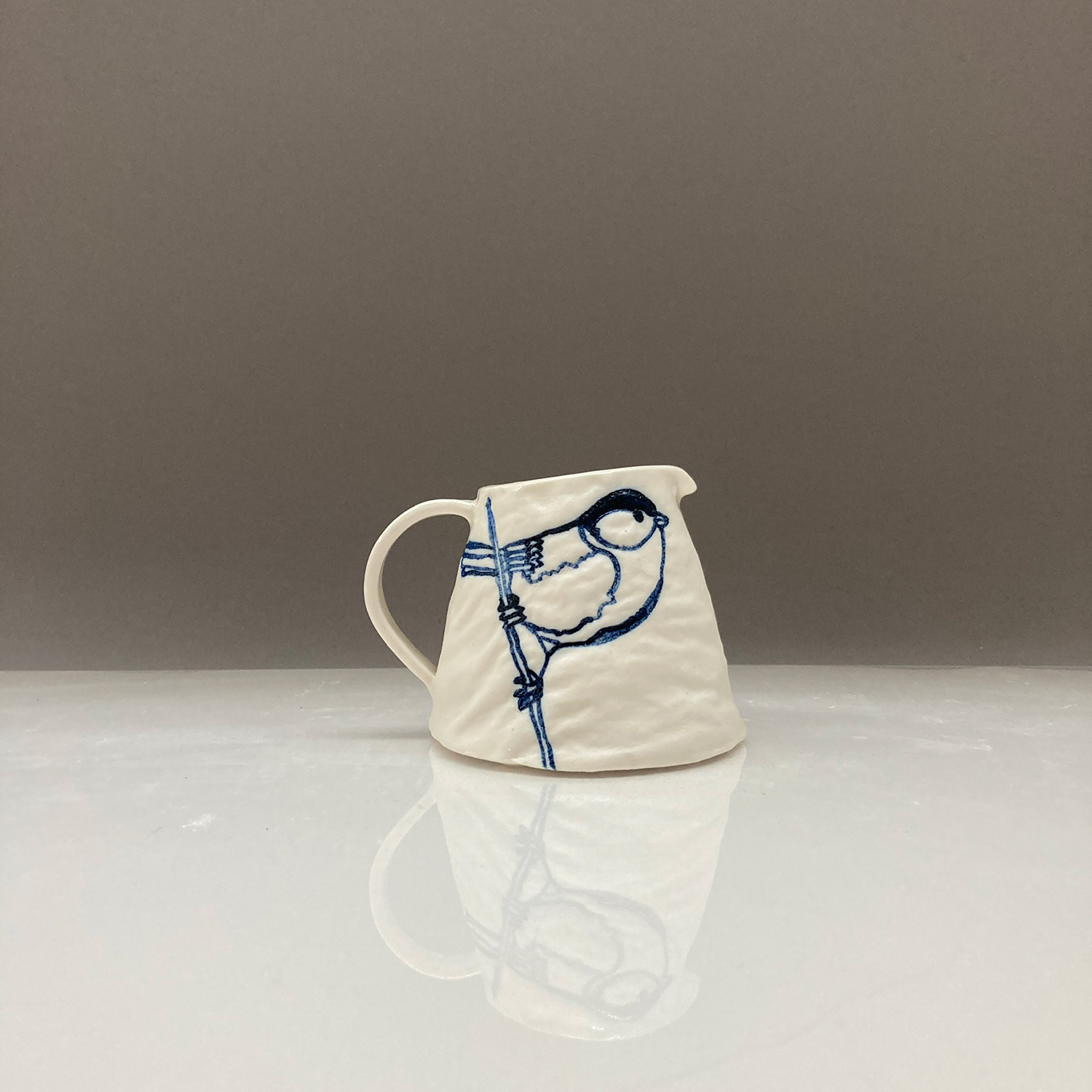 Jug, Great Tit About To Take Flight by Sarah Grove